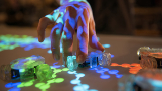 Illustration for article titled Tiny Robots Add Physical Controls and Dials To Giant Touchscreens